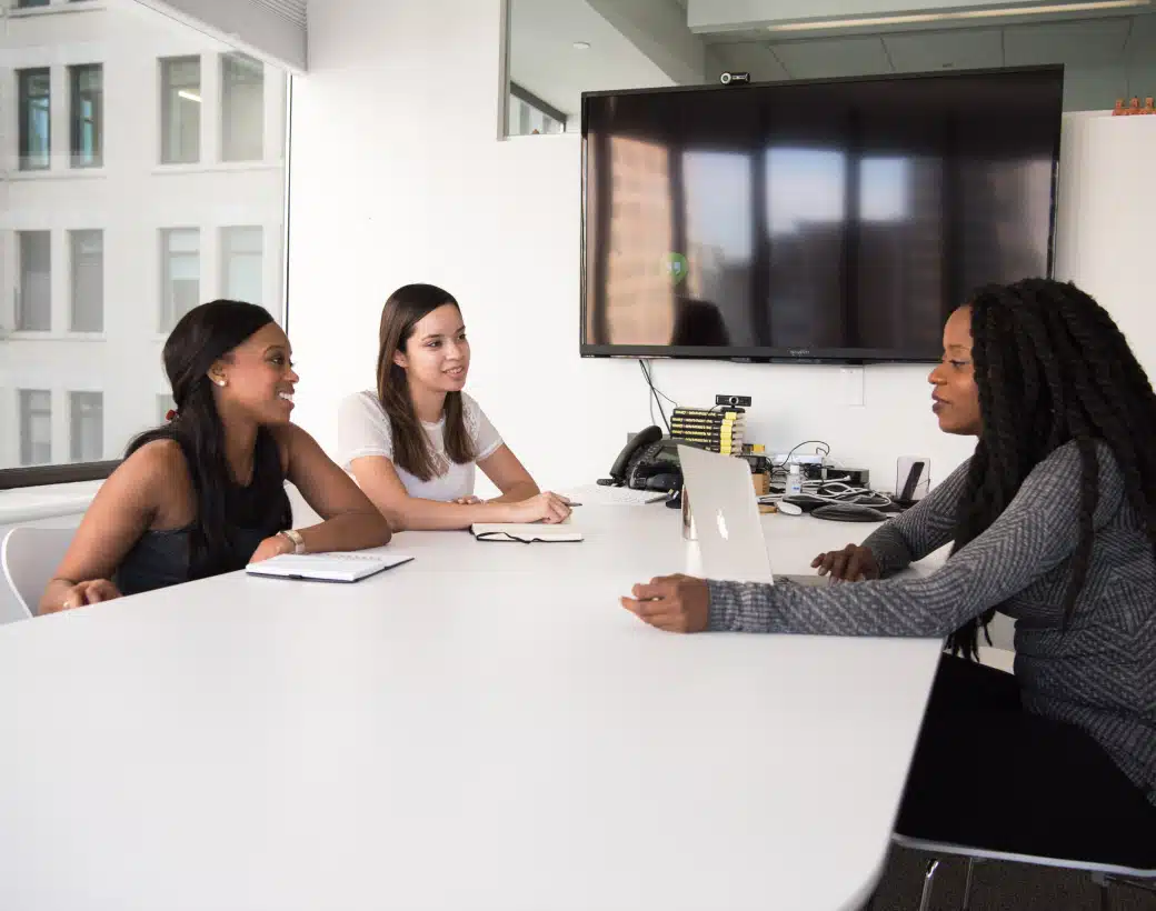 Colleagues sitting in office