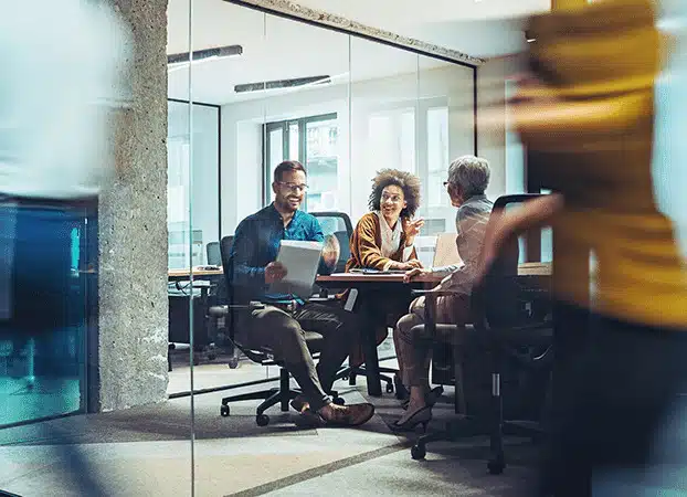 Colleagues sitting in office
